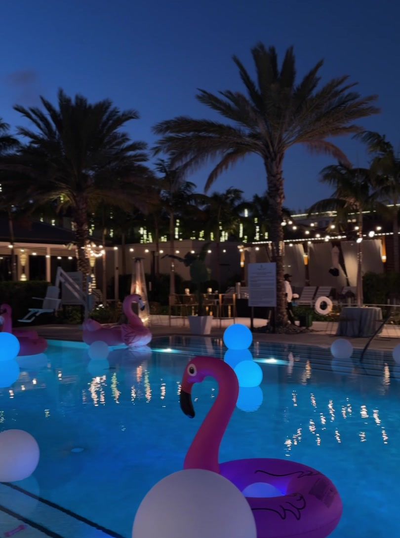 Joseph Daniel performing at an evening waterfront corporate event in Boca Raton